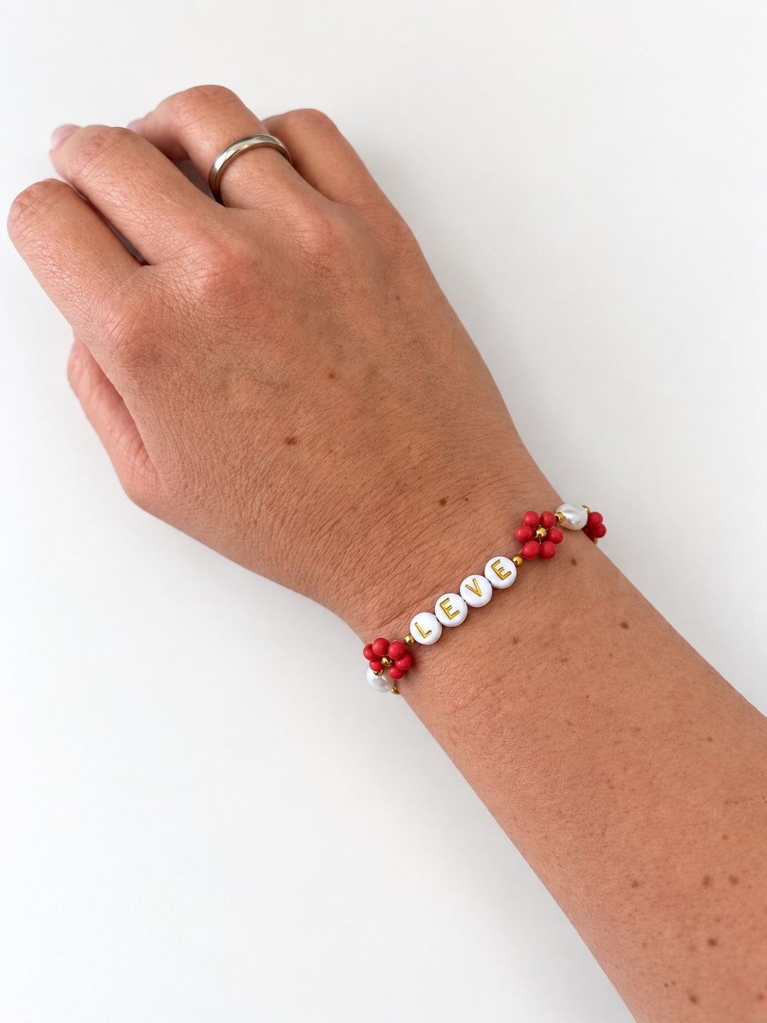 LEVE blomster armbånd